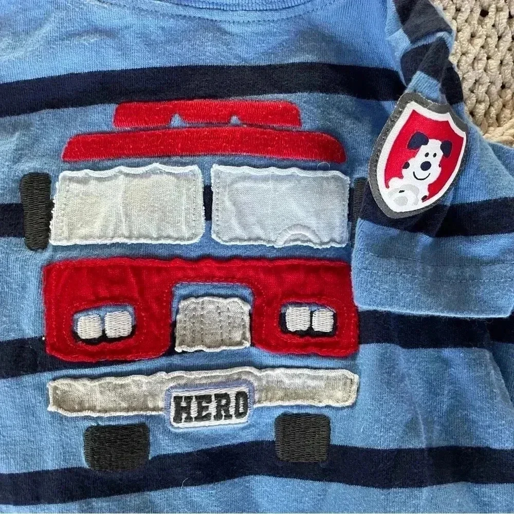 Carter’s 6-9 months blue striped short sleeve fire‎ truck hooded romper​
